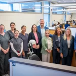 Niagara Community Foundation Executive Director Bryan Rose with dental students and staff at the NC Dental Clinic.
